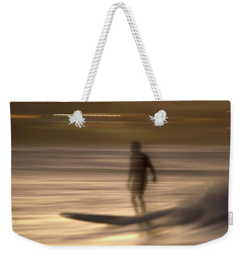 Surf Weekender Tote Bag featuring the photograph In motion 4 by Nicolas Lombard
