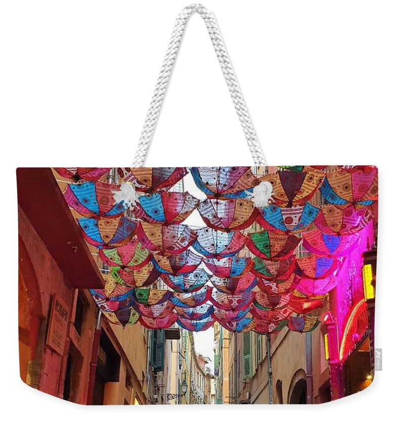 Nice Weekender Tote Bag featuring the photograph Indian Umbrellas in Old Town by Andrea Whitaker
