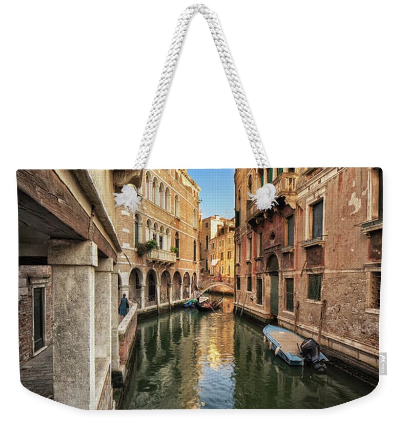 Canal Weekender Tote Bag featuring the photograph Inside a Venetian canal by The P