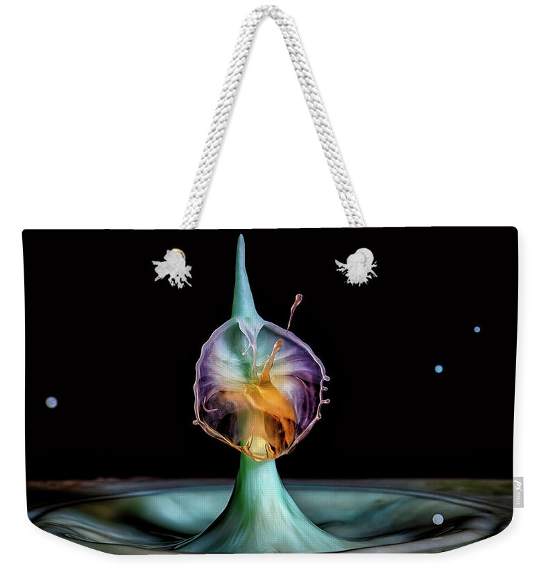 Water Drop Collisions Weekender Tote Bag featuring the photograph The Wizard by Michael McKenney