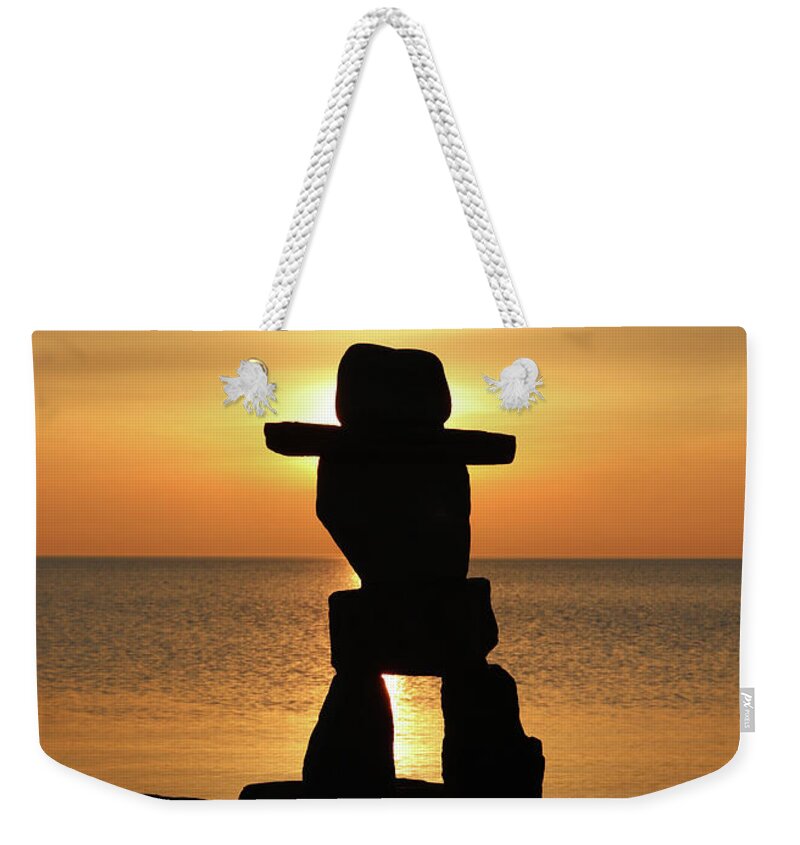 Inuksuk Weekender Tote Bag featuring the photograph Inuksuk Silhouette by David T Wilkinson
