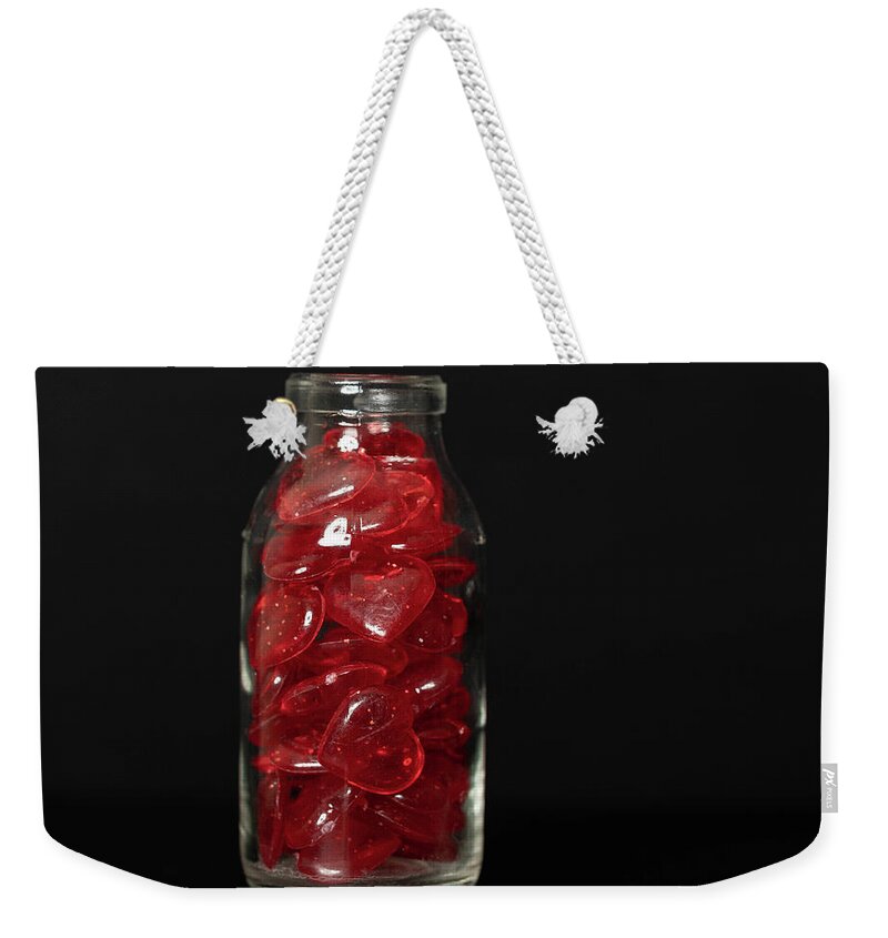 Jar Weekender Tote Bag featuring the photograph Jar of Red Hearts by Amelia Pearn