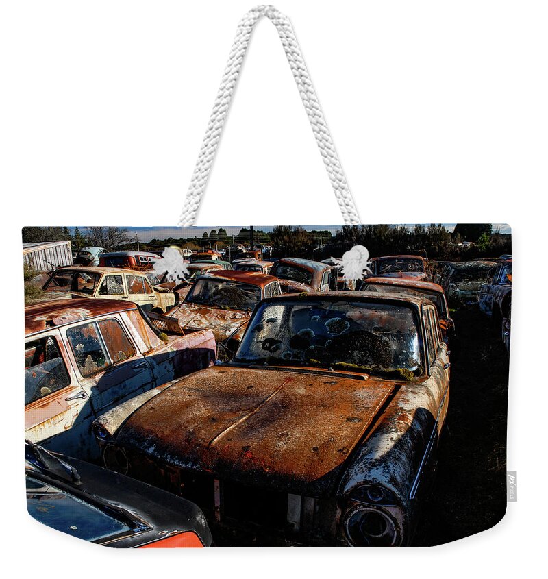 Wrecking Yard Weekender Tote Bag featuring the photograph The Junkyard Diaries VI - Smash Palace, North Island. New Zealand by Earth And Spirit
