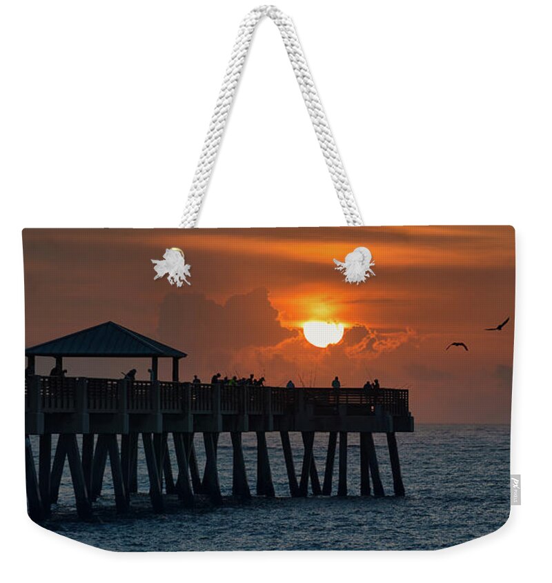 Juno Beach Pier Weekender Tote Bag featuring the photograph Juno Beach Pier Sunrise and Birds Atlantic Ocean by Kim Seng