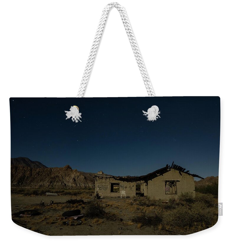 Night Weekender Tote Bag featuring the photograph La Quinta Abandoned Stars by Chris Casas