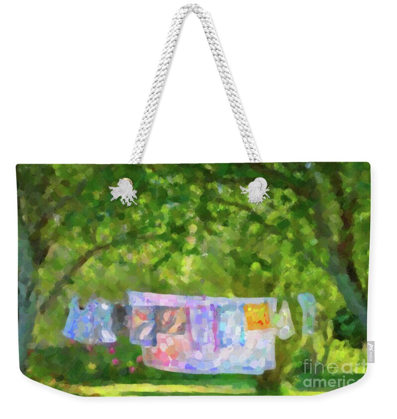 Laundry Weekender Tote Bag featuring the painting Laundry hanging in a garden by Delphimages Photo Creations