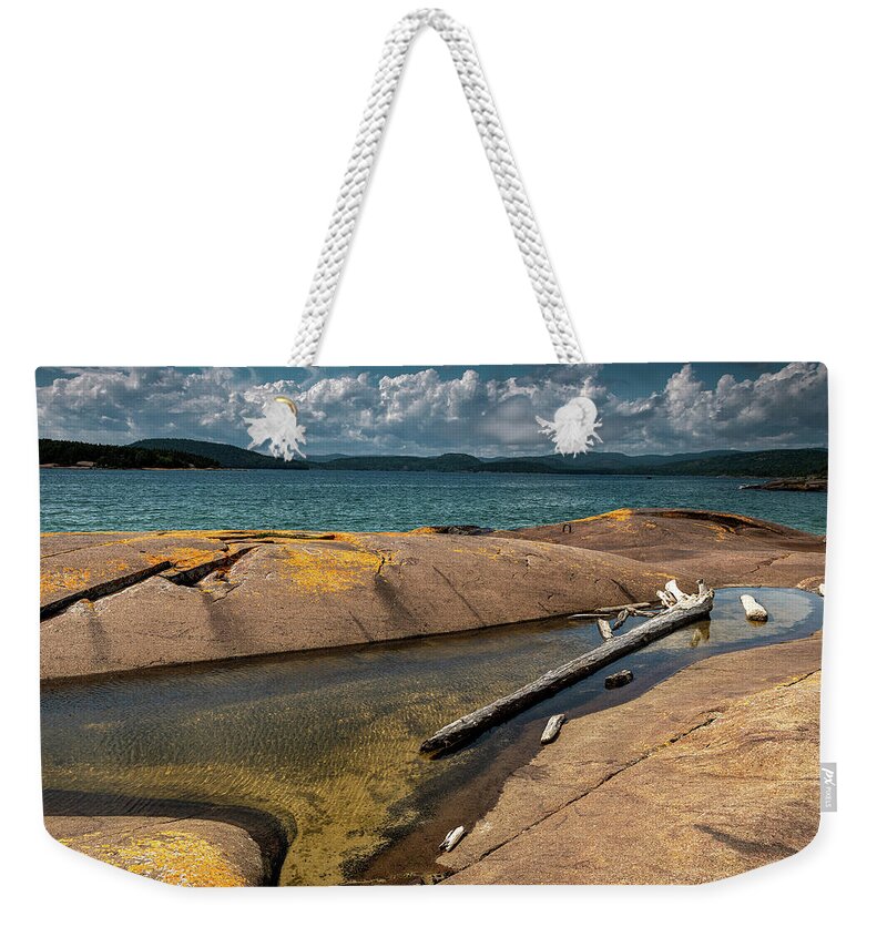 Rocks Weekender Tote Bag featuring the photograph Lazy Logs by Doug Gibbons