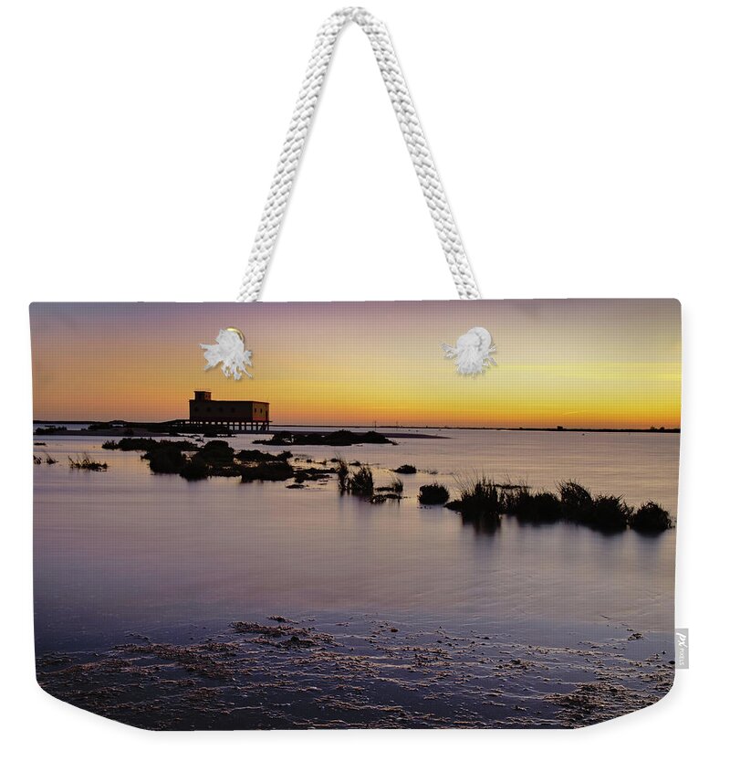 Portugal Weekender Tote Bag featuring the photograph Lifesavers building and tides in Fuzeta by Angelo DeVal