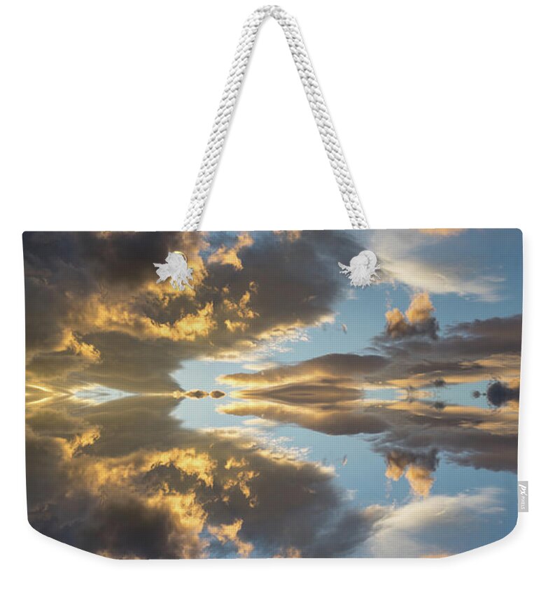 Heaven Weekender Tote Bag featuring the digital art Light and golden clouds in the blue sky by Adriana Mueller