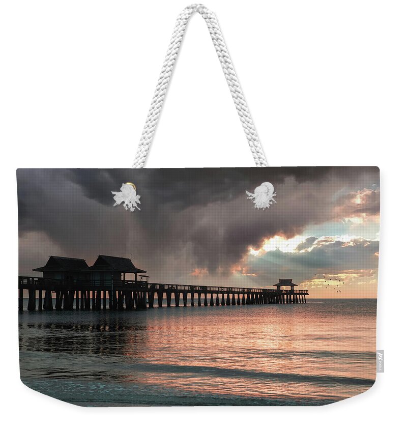 Florida Weekender Tote Bag featuring the photograph Light On The Pier by Ed Taylor