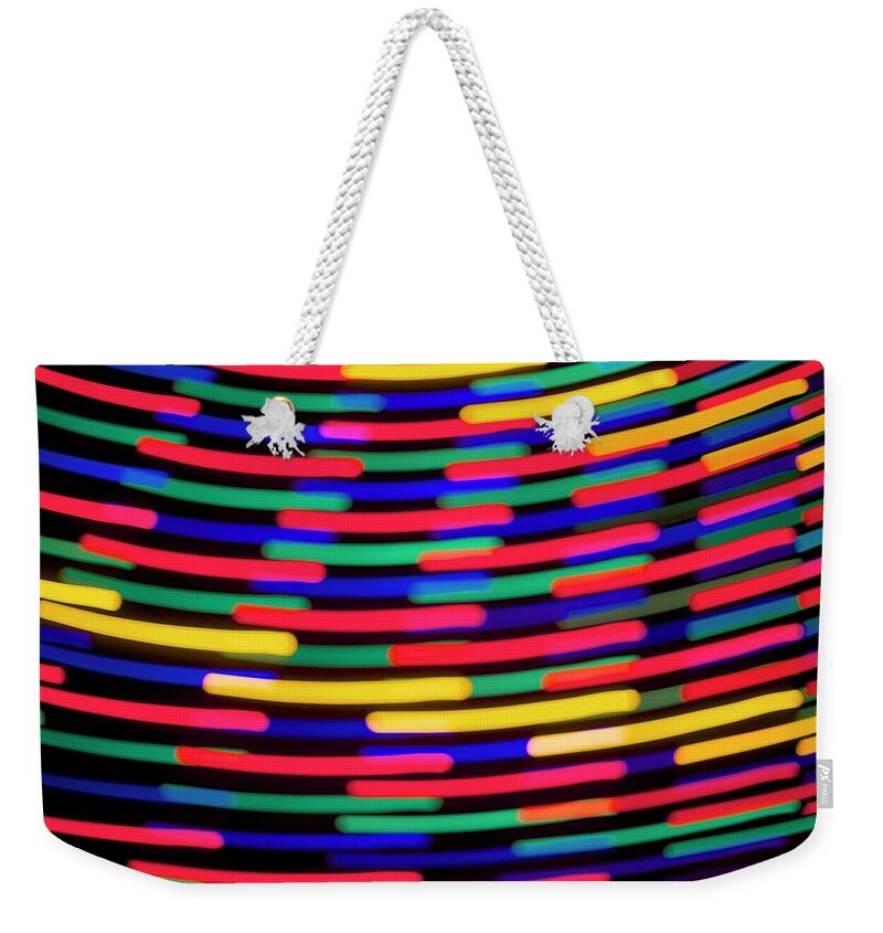 Light Weekender Tote Bag featuring the photograph Light Painting - The Carosel by Sean Hannon
