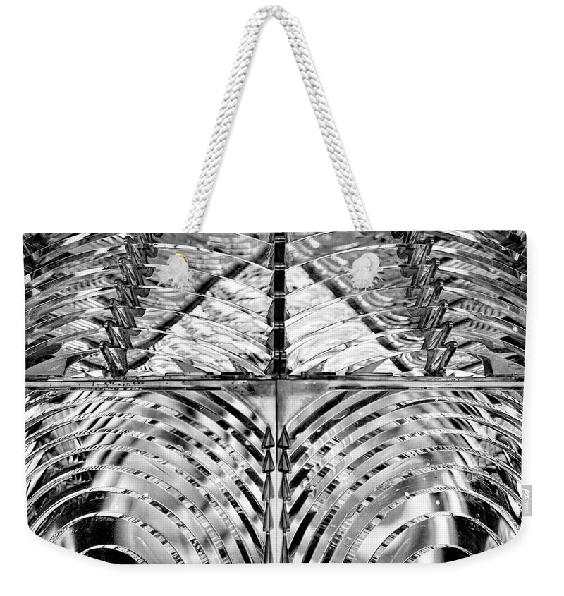 Black Weekender Tote Bag featuring the photograph Lighthouse Glass in Black and White by Carolyn Hutchins