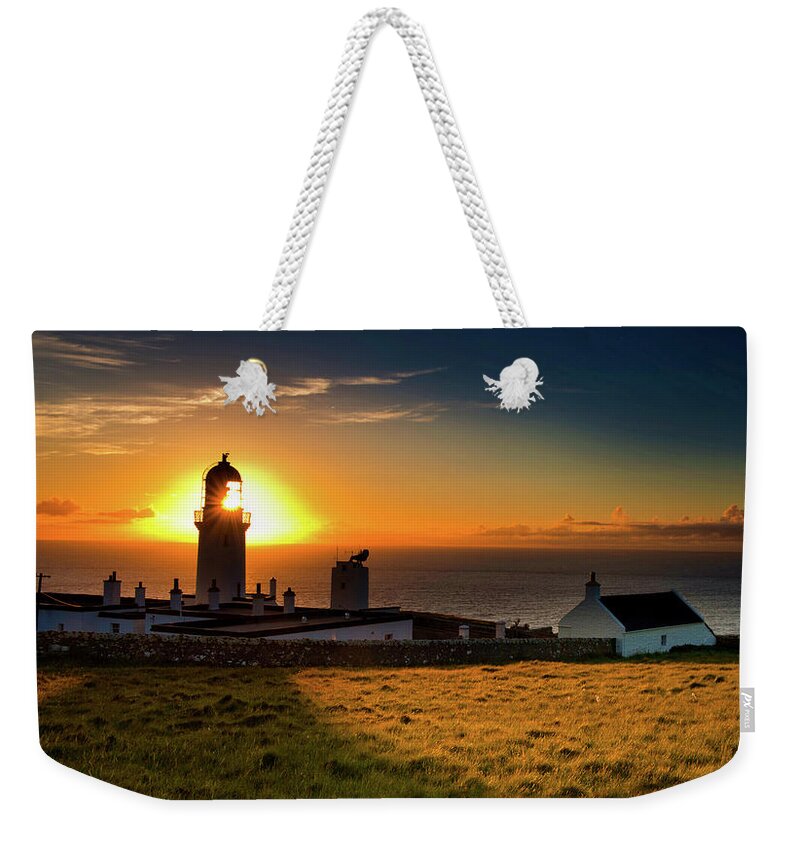 Scotland Weekender Tote Bag featuring the digital art Lighthouse, by Remigiusz MARCZAK