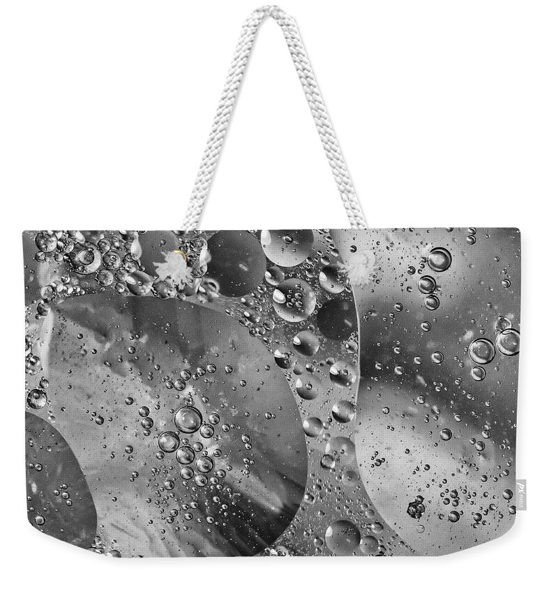 Abstract Weekender Tote Bag featuring the photograph Liquid Motion by Charles Floyd