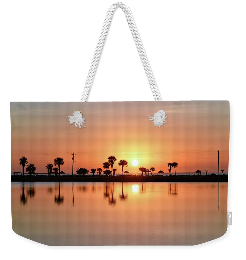 Sunrise Weekender Tote Bag featuring the photograph Little Bay Reflections by Christopher Rice
