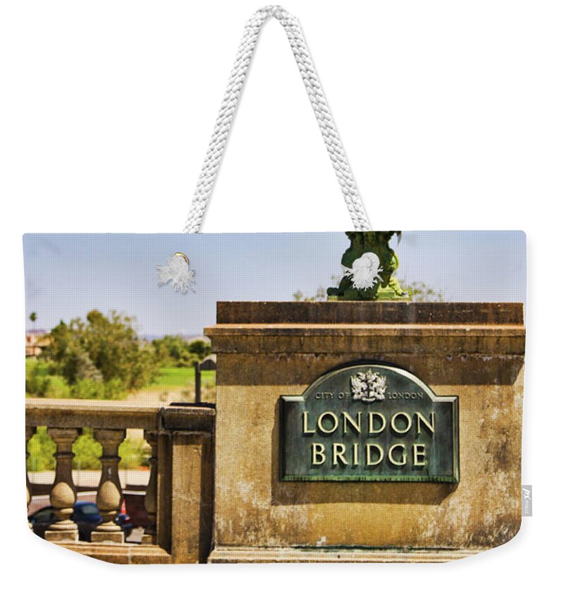 London Bridge Weekender Tote Bag featuring the photograph London Bridge original sign, Arizona by Tatiana Travelways
