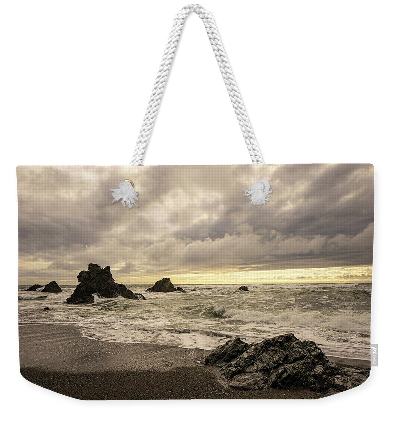 Ocean Weekender Tote Bag featuring the photograph Lone Beach on the Pacific by Janis Knight