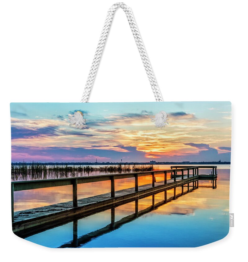 Clouds Weekender Tote Bag featuring the photograph Long Wooden Dock by Debra and Dave Vanderlaan