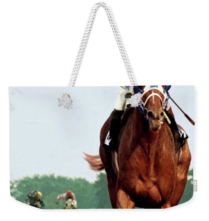 1 1/2 Mile Weekender Tote Bag featuring the painting Looking Back, 1 1/2 mile Belmont Stakes Secretariat 06/09/73 time 2 24 - painting by Thomas Pollart