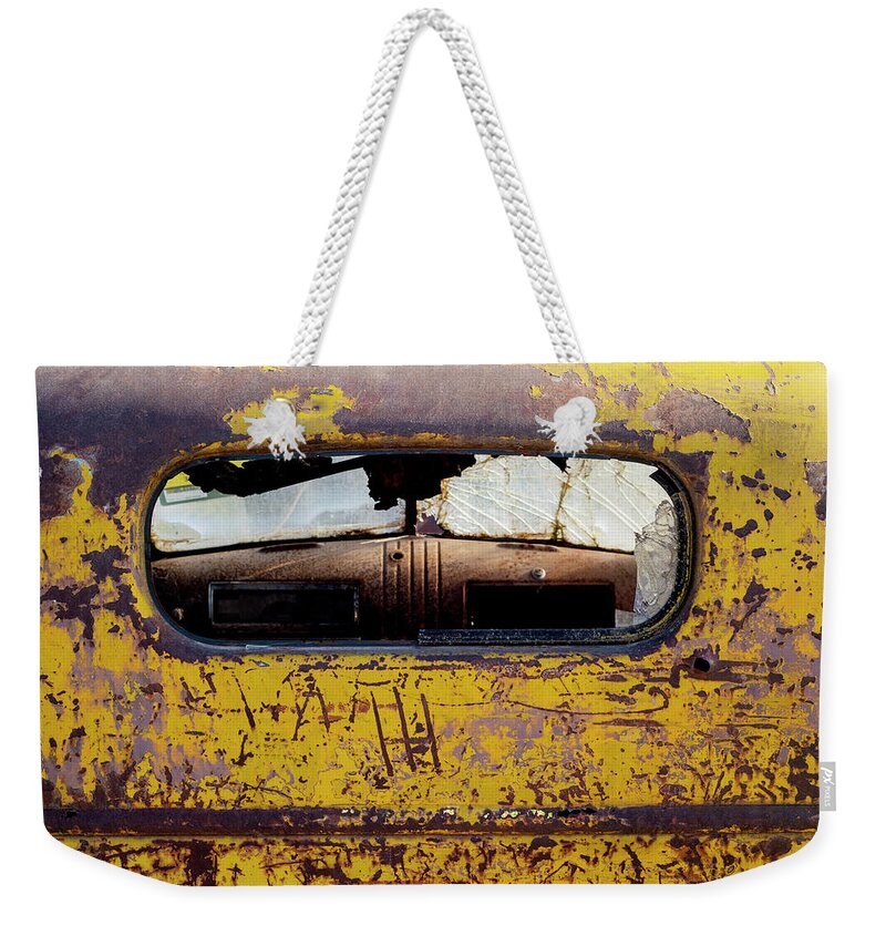 Truck Weekender Tote Bag featuring the photograph Looking through an Old Truck Window by Art Whitton
