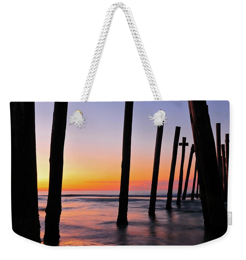 59th Pier Weekender Tote Bag featuring the photograph Looking Through by Louis Dallara