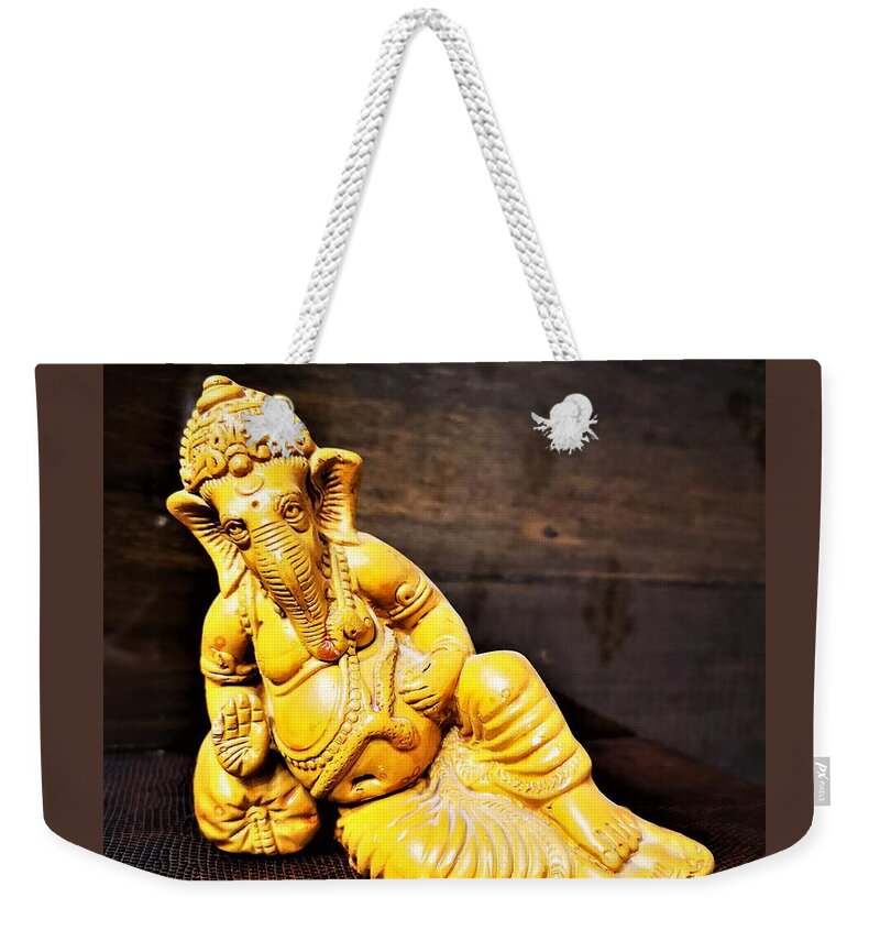 Ganesh Weekender Tote Bag featuring the photograph Lord Ganesha resting by Jarek Filipowicz