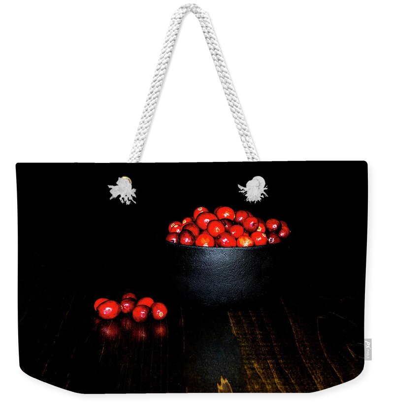 Tabletop Weekender Tote Bag featuring the photograph Low Key Cranberries in Black Bowl on Brown Base by Charles Floyd