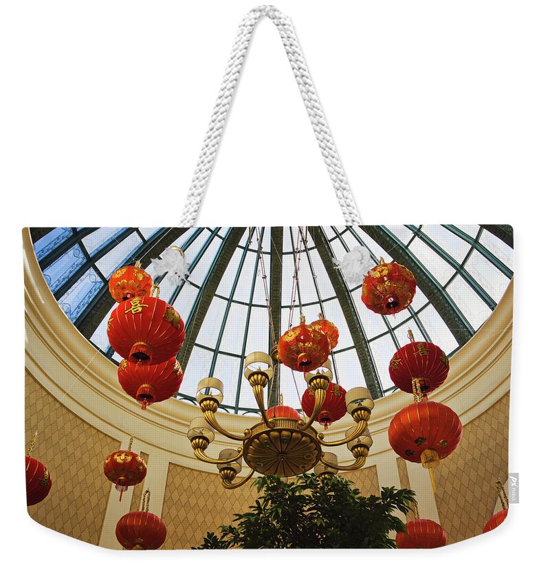 Lunar New Year Weekender Tote Bag featuring the photograph Lunar New Year Ornaments Bellagio, Las Vegas by Tatiana Travelways