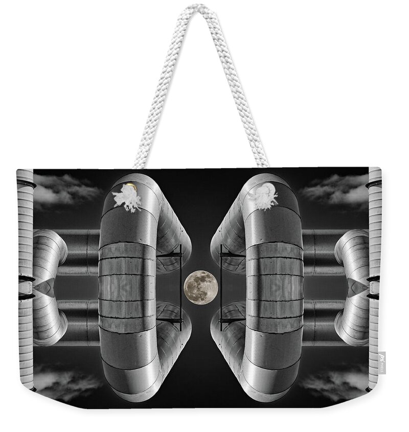 Lunar Weekender Tote Bag featuring the photograph Lunaroyal - mirrored Uniroyal Building Industrial ductting with full moon - wide version by Peter Herman