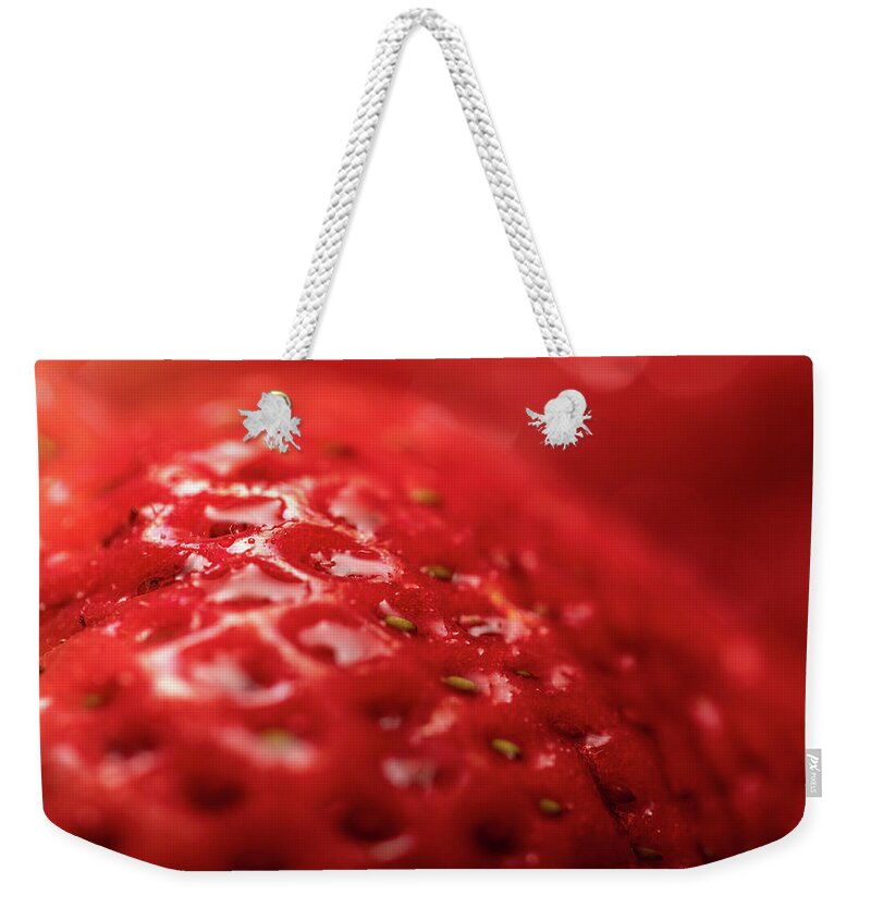 Food Weekender Tote Bag featuring the photograph Macro Photography - Strawberry by Amelia Pearn