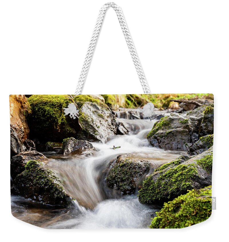Stream Weekender Tote Bag featuring the photograph Maelstrom by Gavin Lewis