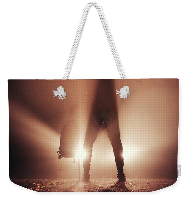 Figure Weekender Tote Bag featuring the photograph Man stands in car lights by Vaclav Sonnek