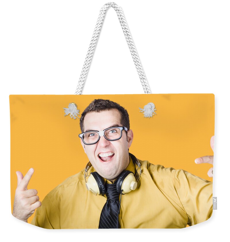 Rock Weekender Tote Bag featuring the photograph Man with headphones by Jorgo Photography
