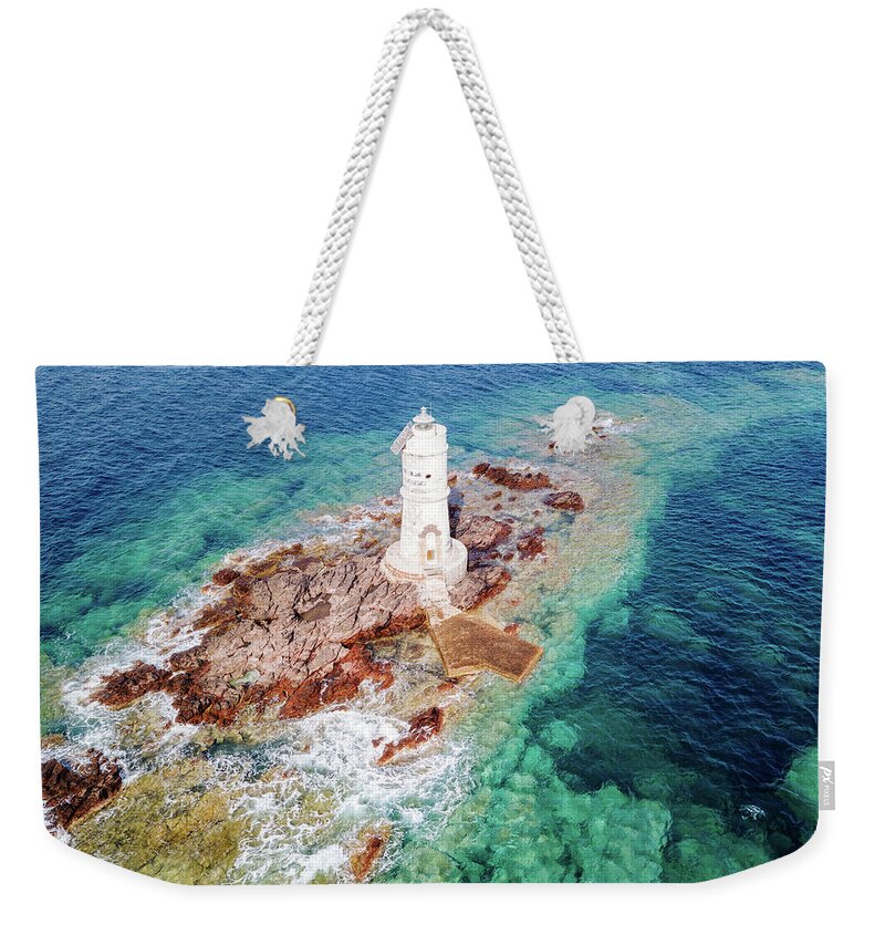Lighthouse Weekender Tote Bag featuring the photograph Mangiabarche by Francesco Riccardo Iacomino
