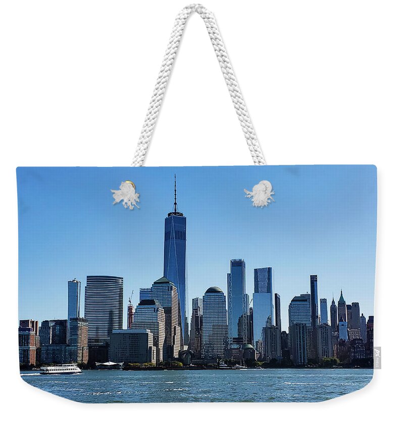 Manhattan Weekender Tote Bag featuring the photograph Manhattan's New Skyline by Ron Long Ltd Photography