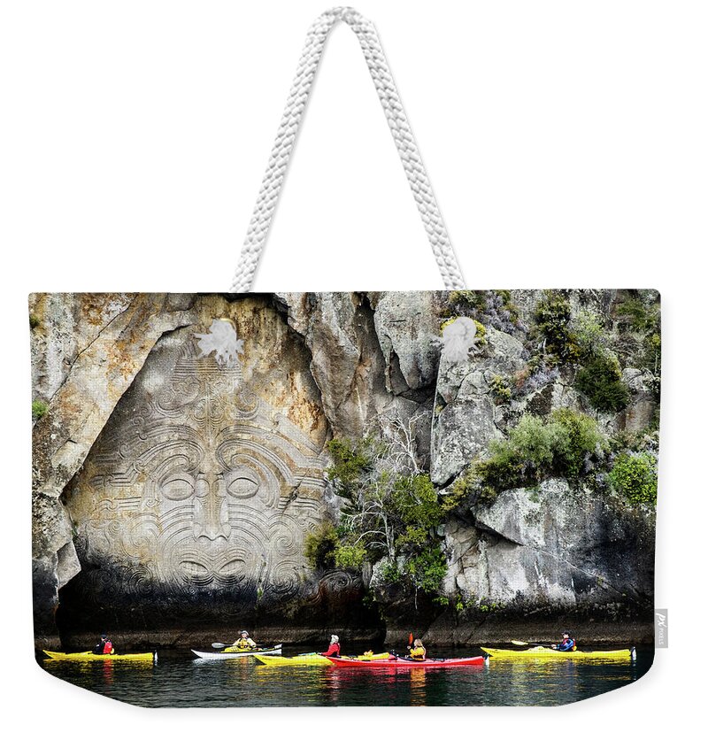 Lake Taupo Weekender Tote Bag featuring the photograph Ancestors - Maori Rock Carving, Lake Taupo, New Zealand by Earth And Spirit