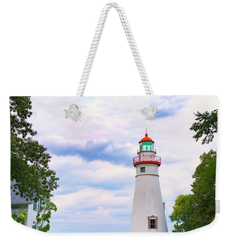 Lake Erie Lighthouse Weekender Tote Bag featuring the photograph Marblehead Lighthouse Framed by Trees 1 by Marianne Campolongo