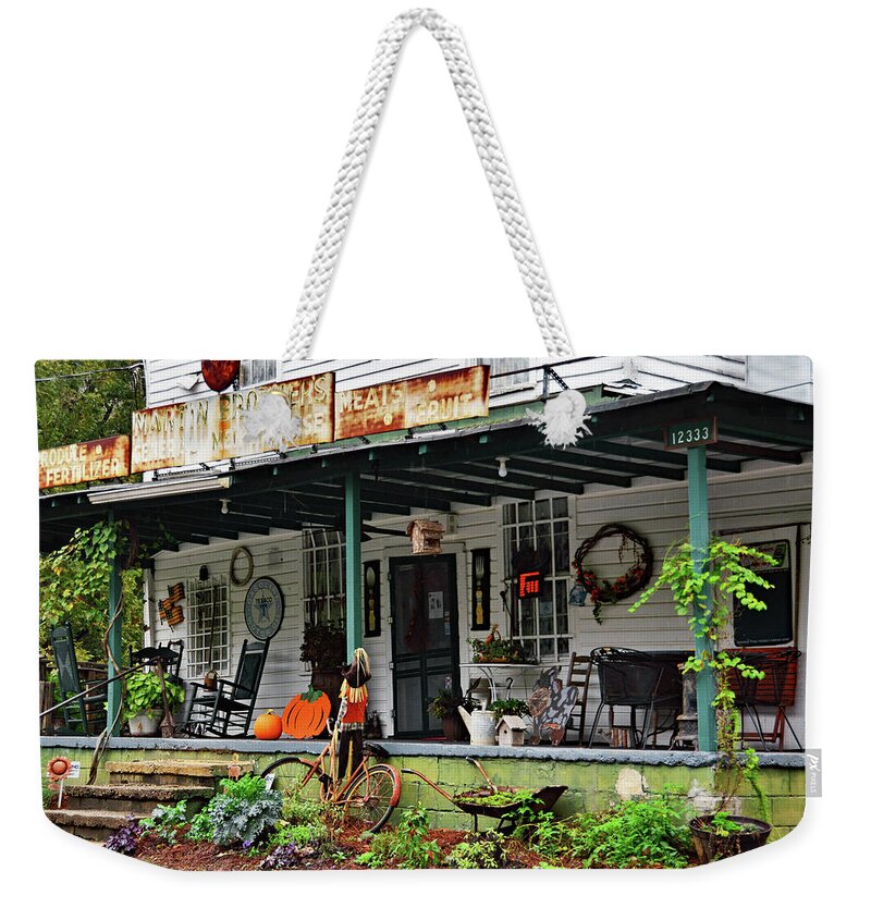 Martin’s General Store Weekender Tote Bag featuring the photograph Martins General Store by Ben Prepelka