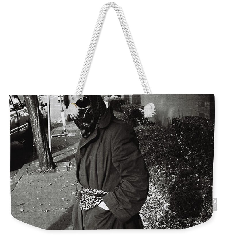 Street Photography Weekender Tote Bag featuring the photograph Masked by Chriss Pagani