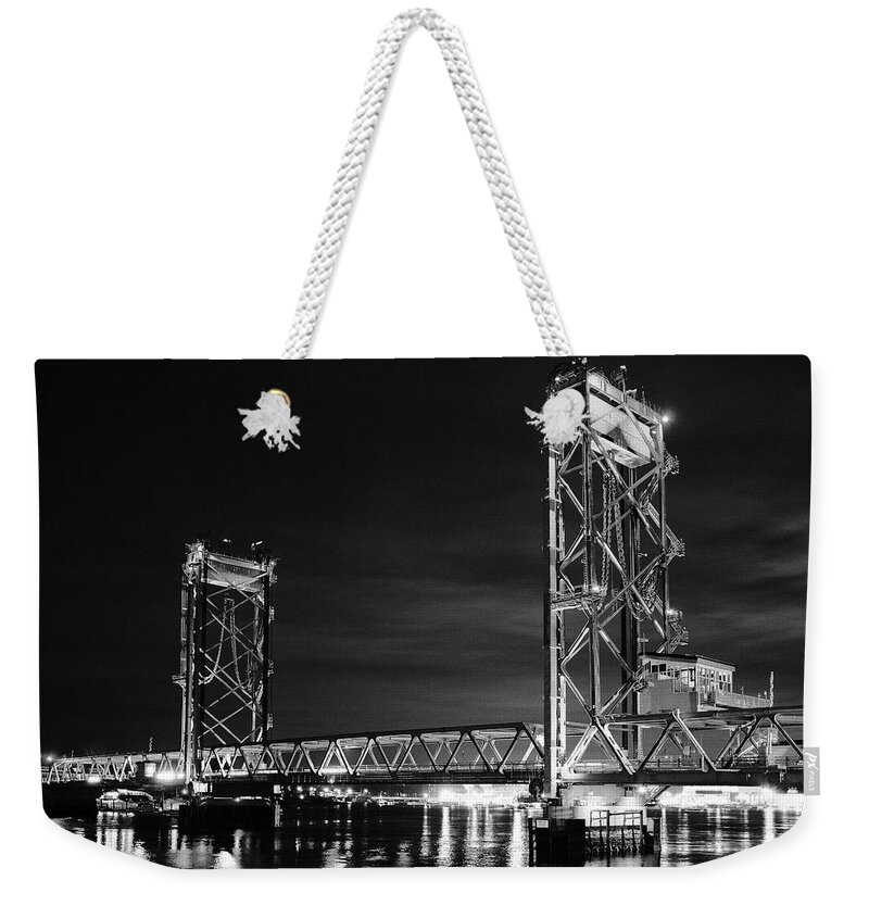 Acros Weekender Tote Bag featuring the photograph Memorial Bridge, A Night In Monochrome. by Jeff Sinon