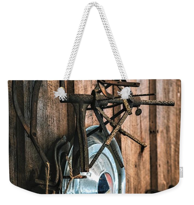  Weekender Tote Bag featuring the photograph Mercury by Marcus Moller