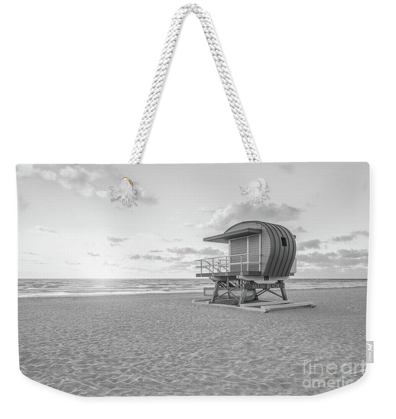 1st Weekender Tote Bag featuring the photograph Miami Beach 1st Street Lifeguard Tower Black and White Photo by Paul Velgos