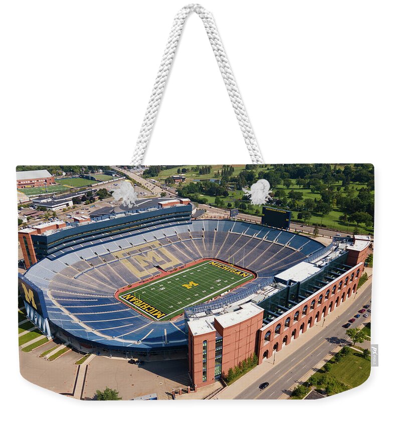 Michigan Football Weekender Tote Bag featuring the photograph Michigan Stadium overhead by Eldon McGraw
