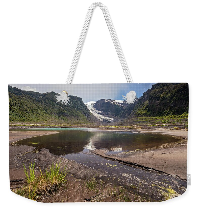 Chile Weekender Tote Bag featuring the photograph Michinmahuida glacier with pond reflexion by Henri Leduc