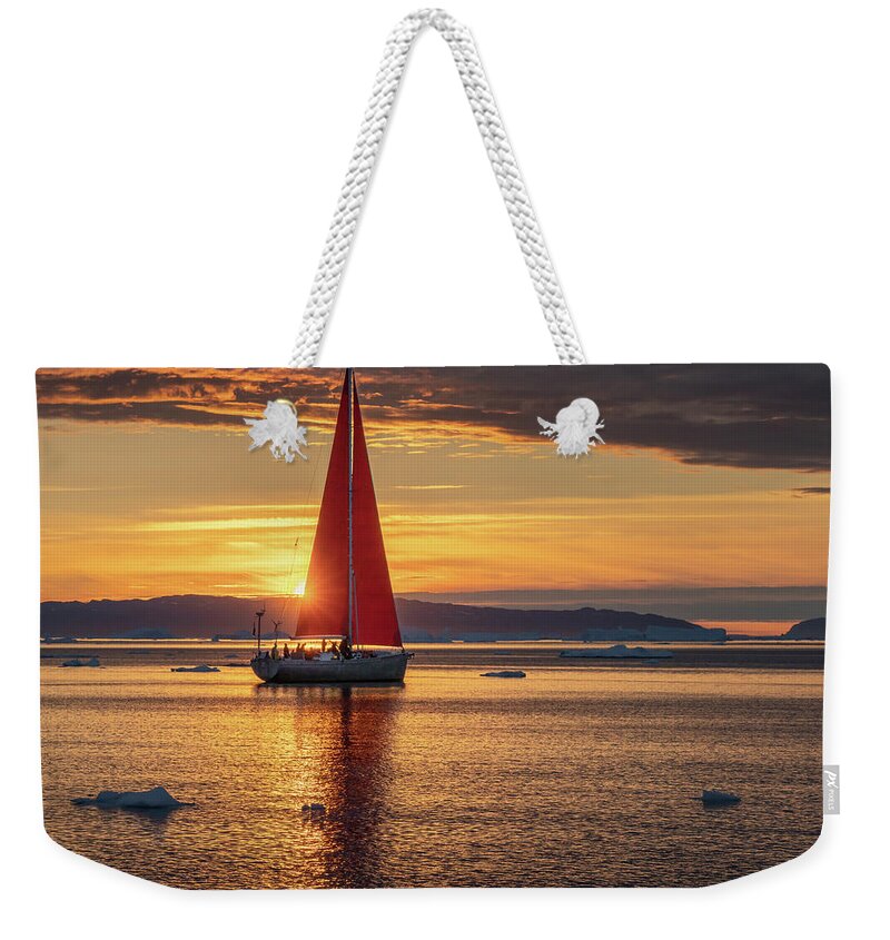 Greenland Weekender Tote Bag featuring the photograph Midnight sun in Greenland by Anges Van der Logt