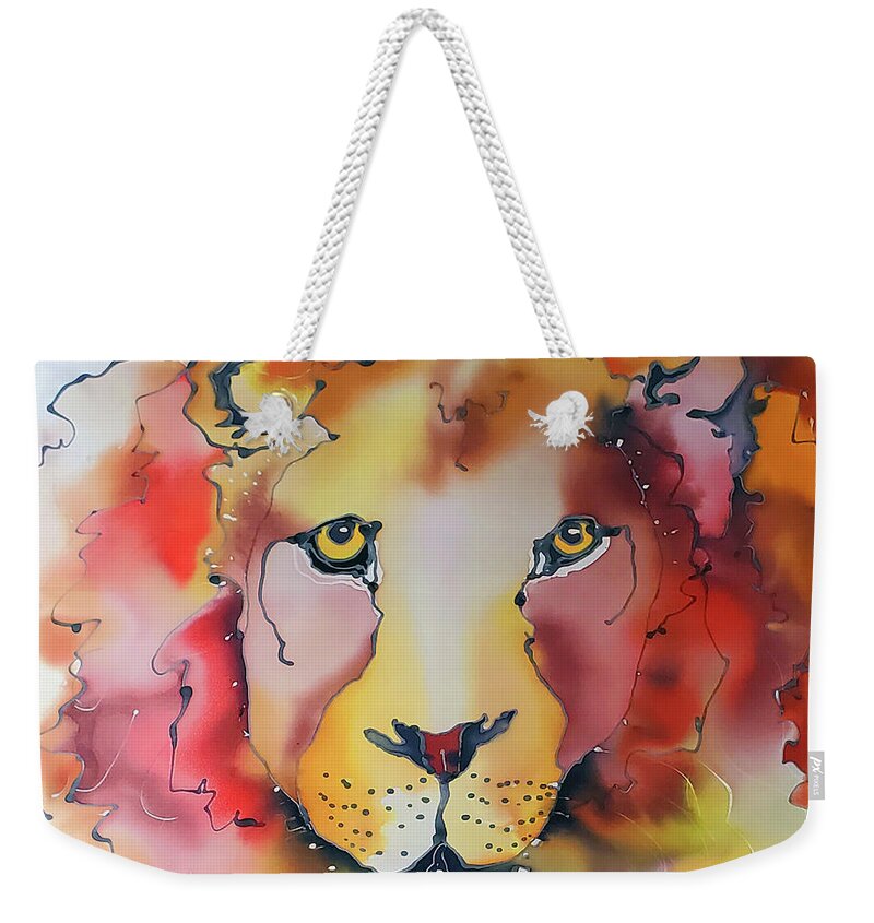 A Mighty Lion King In All His Glory With Sensitive Golden Eyes And A Vibrant Wild Mane In Yellow Weekender Tote Bag featuring the tapestry - textile Mighty Lion by Karla Kay Benjamin