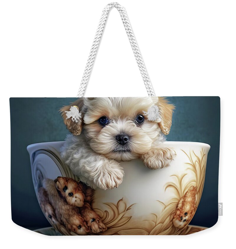 Maltipoo Weekender Tote Bag featuring the photograph Miniture Maltipoo Puppy in a Tea Cup by Jim Vallee