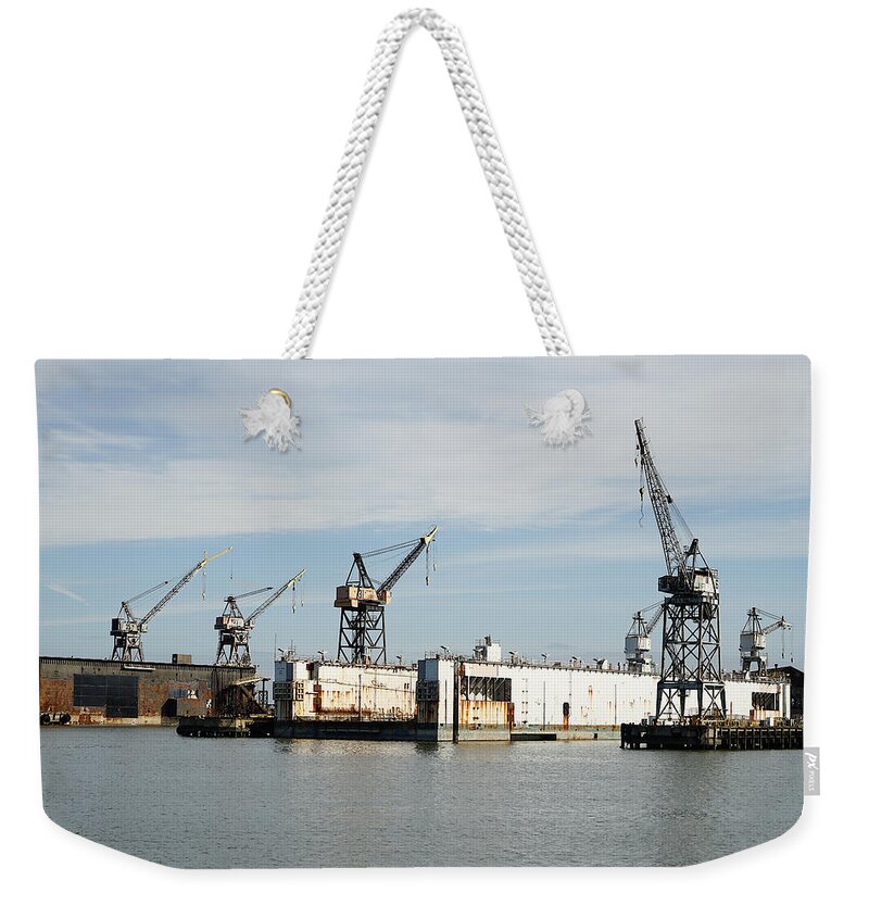 Richard Reeve Weekender Tote Bag featuring the photograph Mission Bay Cranes by Richard Reeve
