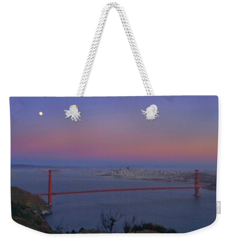 The Buena Vista Weekender Tote Bag featuring the photograph Moon Over The Golden Gate by Tom Singleton