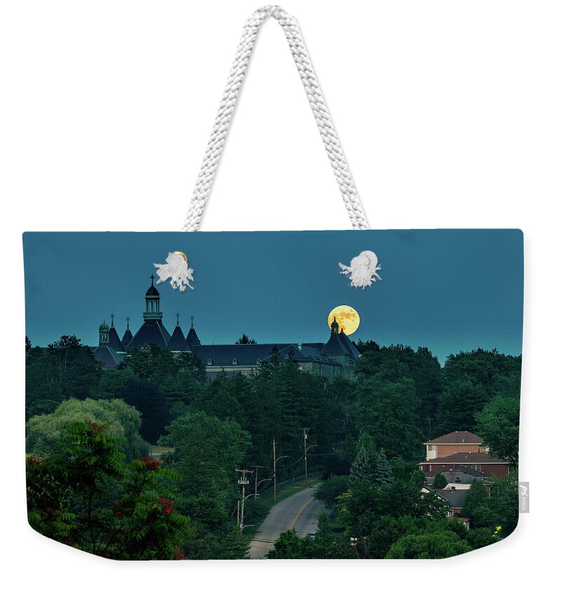 Dunwoodie Weekender Tote Bag featuring the photograph Moonrise over Dunwoodie 2 by Kevin Suttlehan